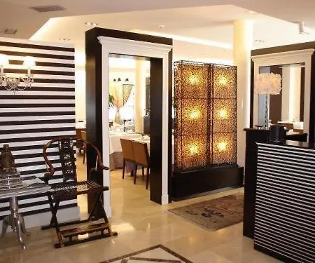 Asador H.m. Versus Hotel