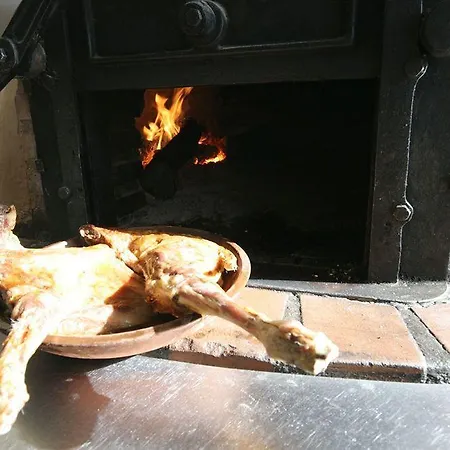 Asador H.m. Versus Hotel