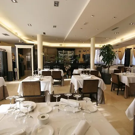 Asador H.m. Versus Hotel Burgo