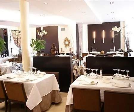 Hotel Asador H.m. Versus