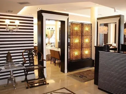 Asador H.m. Versus Hotel