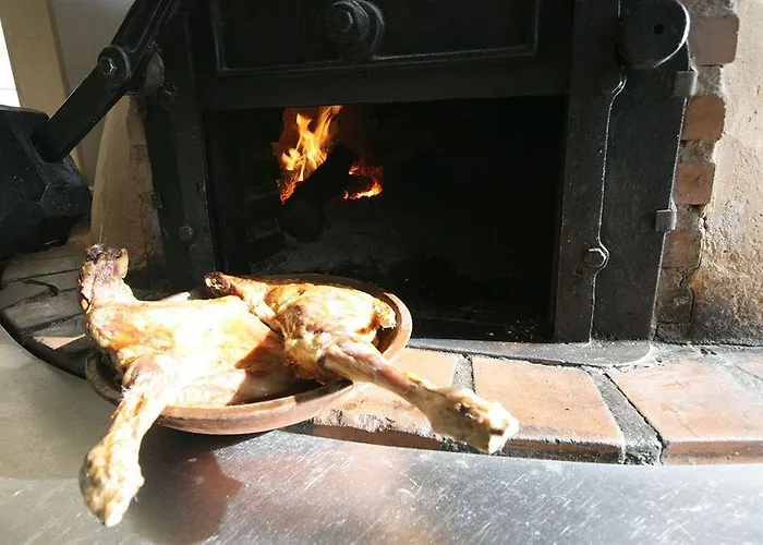 Asador H.m. Versus Hotel