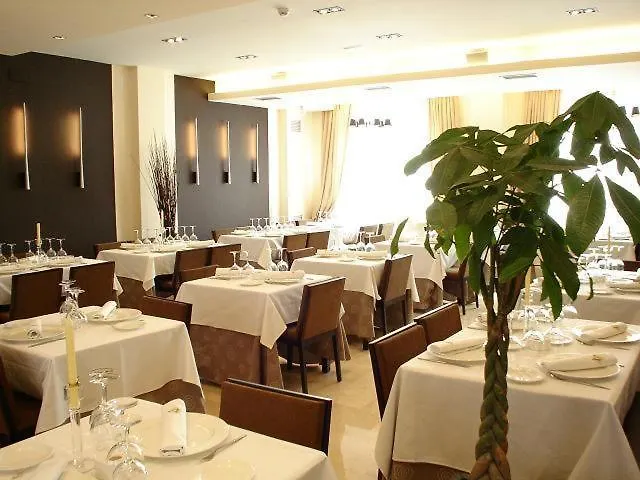 Asador H.m. Versus Hotel Burgo