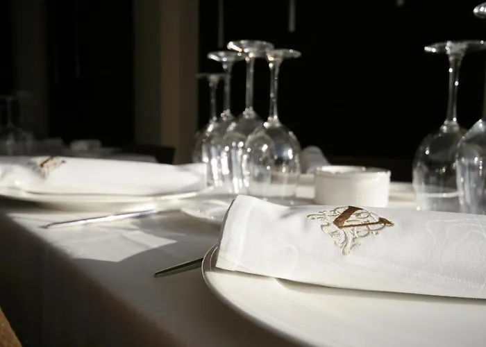 Hotel Asador H.m. Versus