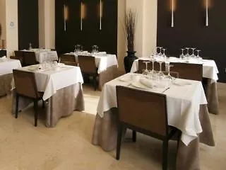 Asador H.m. Versus Hotel