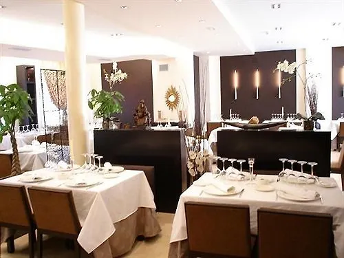 Hotel Asador H.m. Versus